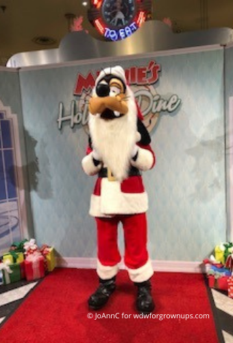 Santa Goofy Poses For Pictures